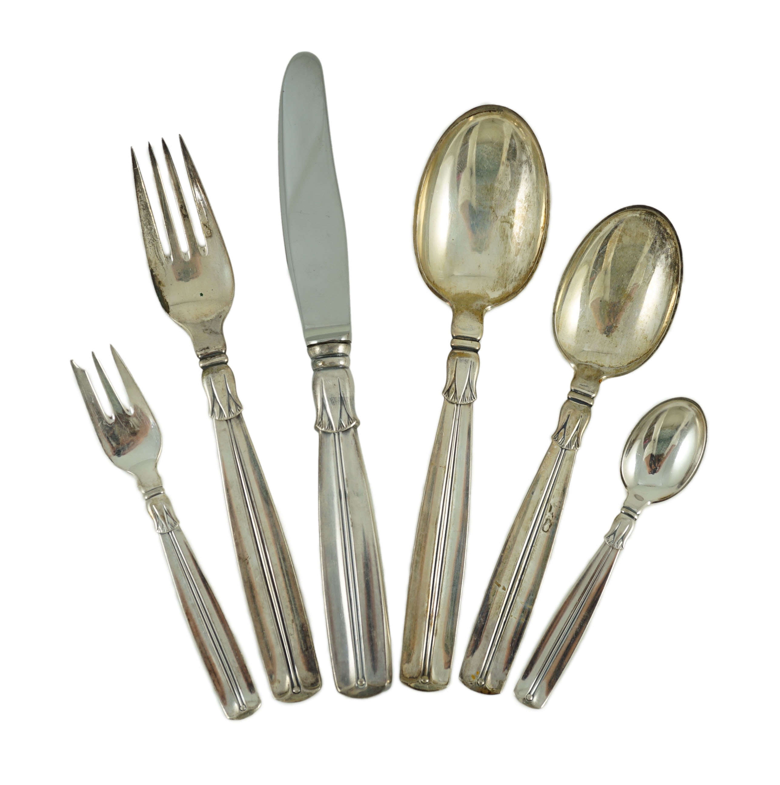 A mid 20th century harlequin part canteen of Danish 830 standard flatware by Broderne, W & S Sorensen
